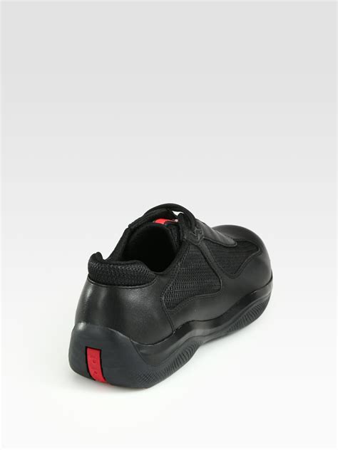 prada americas cup low top triple black mesh